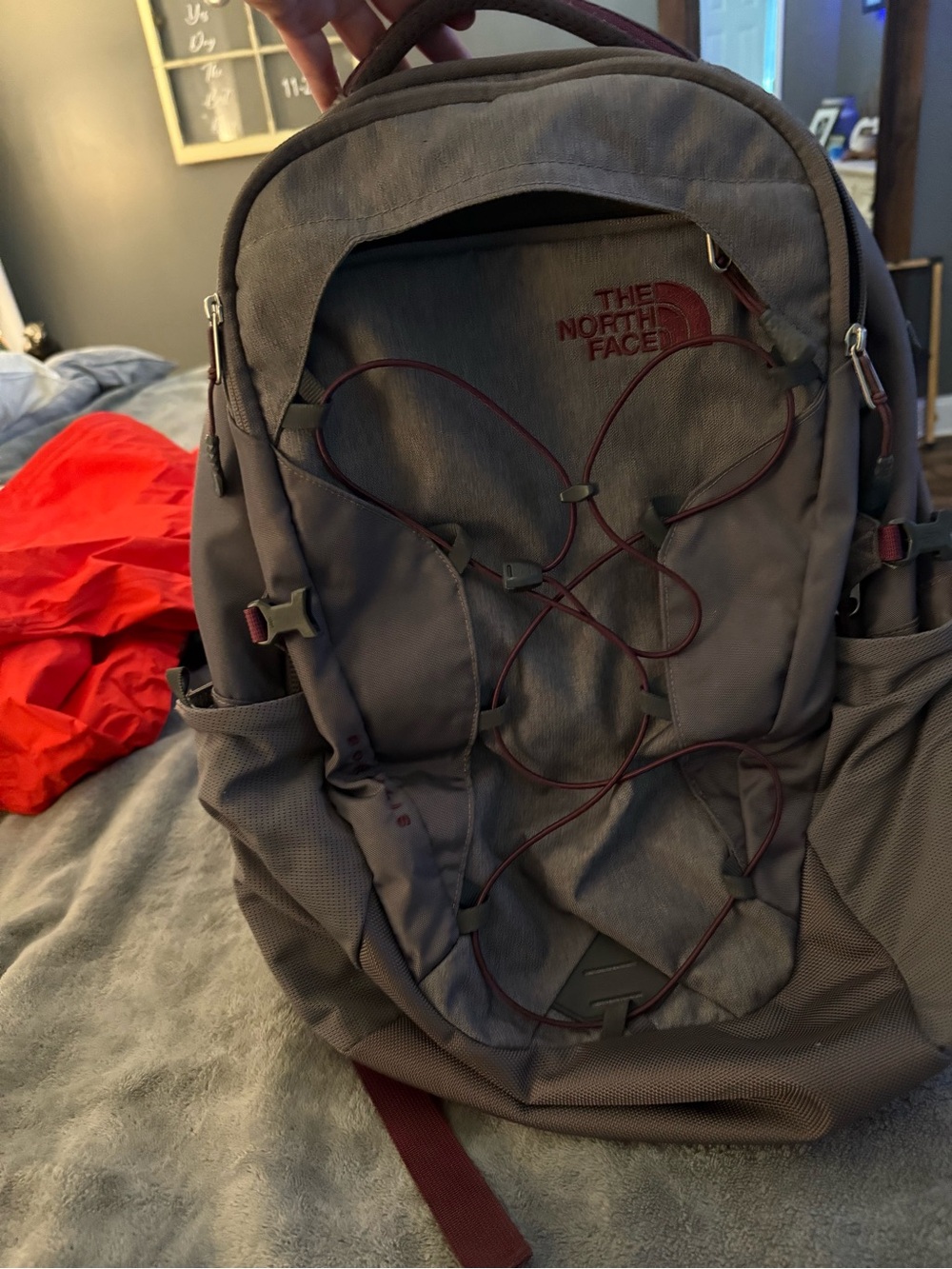 The North Face Women’s Gray Backpack with Burgundy Accents